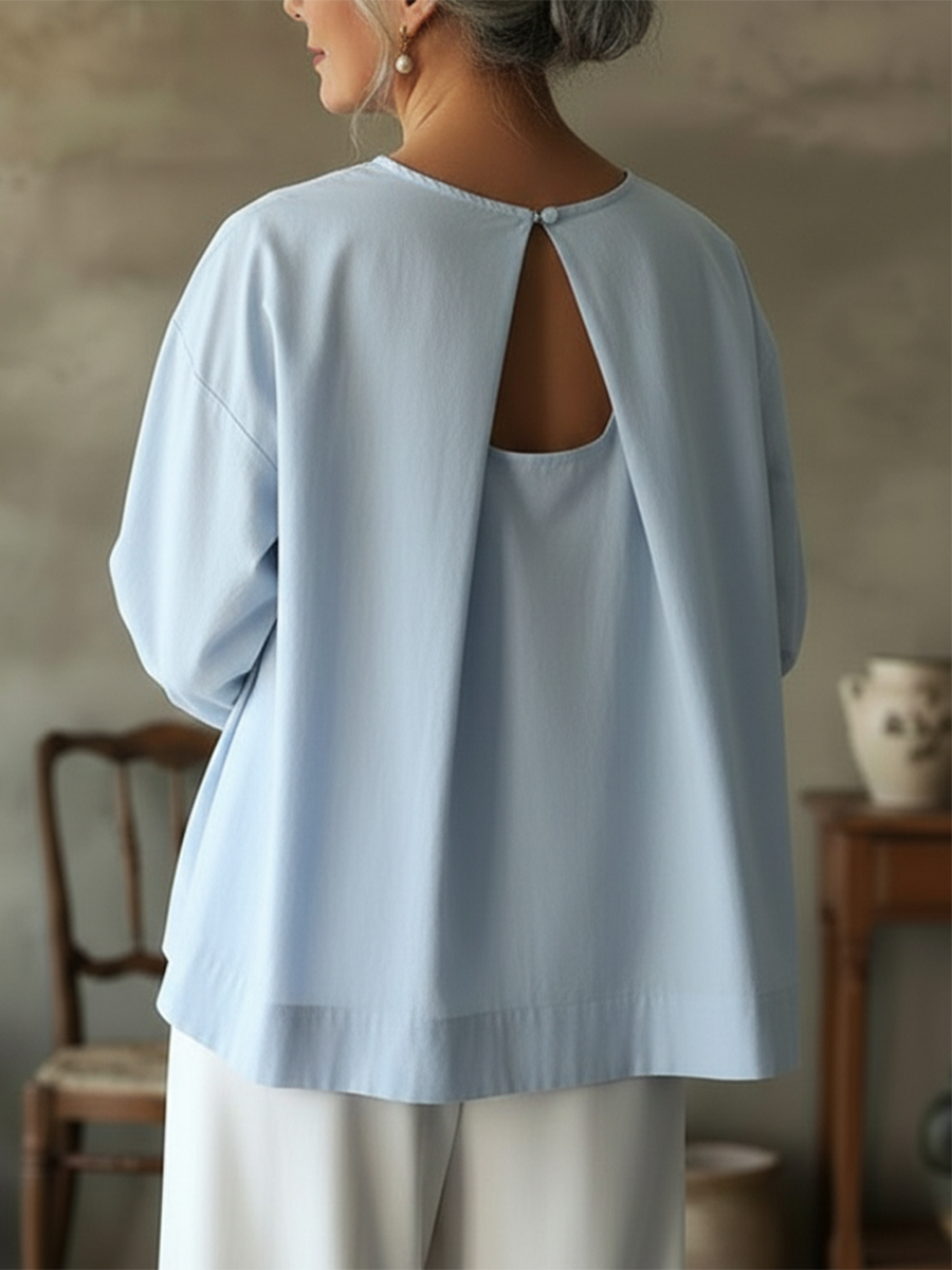 Elegante top senza schienale in 100% cotone.