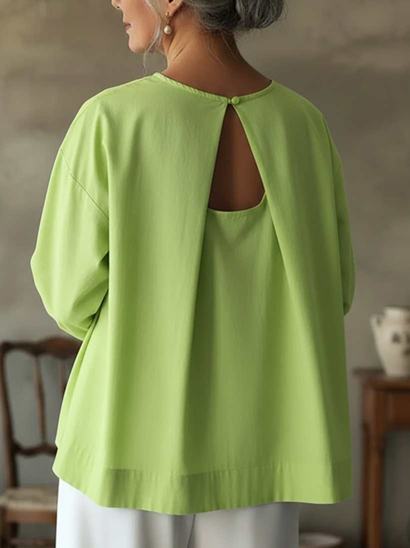 Elegante top senza schienale in 100% cotone.