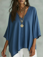 Camicia in denim comoda e ampia con scollo a V