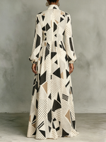 Classic Abstract Geometric Dress — Featuring A Turn-down Collar, Cinched Waist, And Flared Skirt