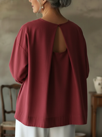 Elegante top senza schienale in 100% cotone.