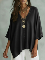 Camicia in denim comoda e ampia con scollo a V