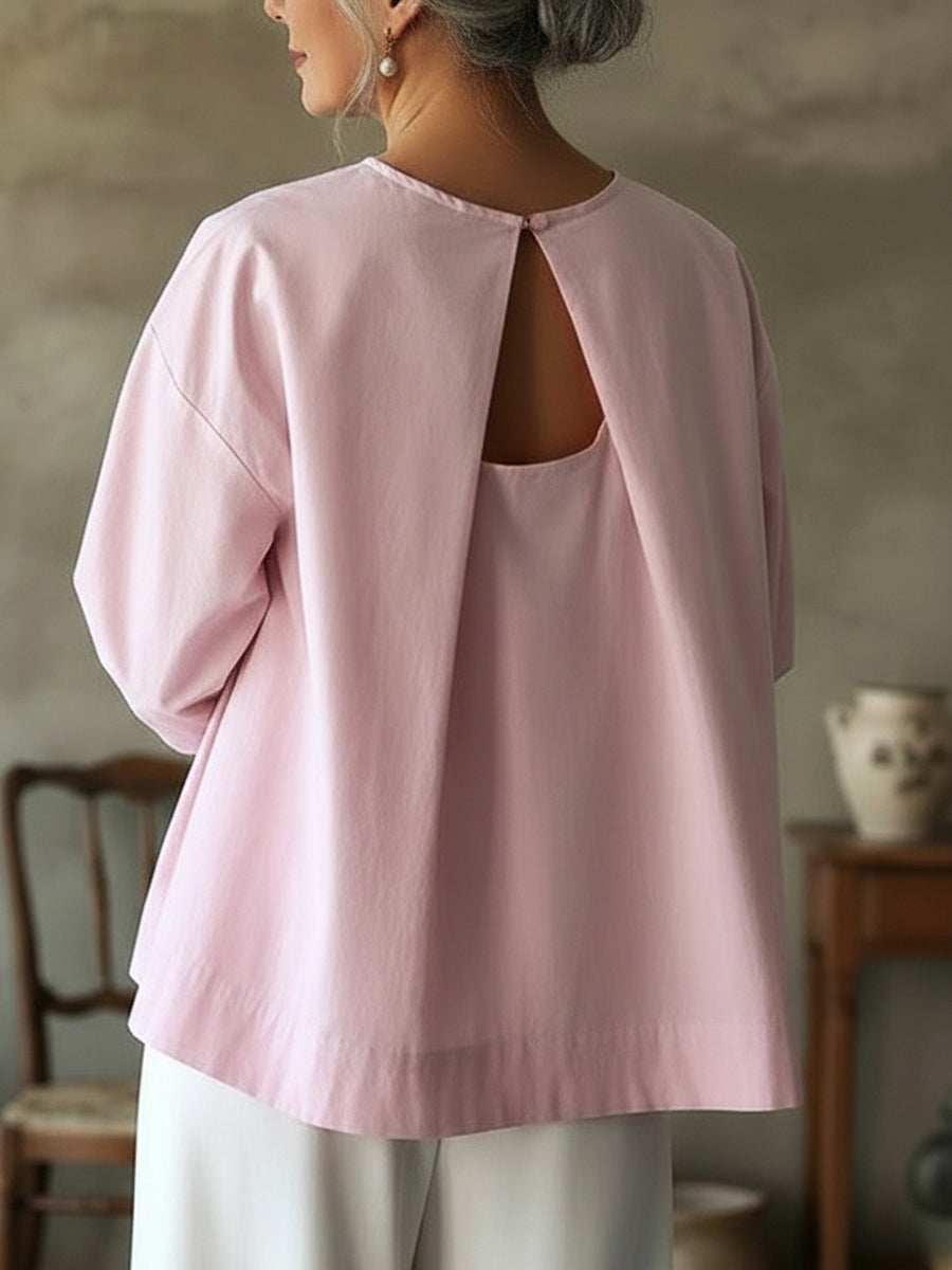 Elegante top senza schienale in 100% cotone.