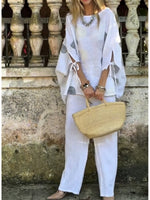 Two-piece Set Featuring A Loose, Casual Polka-dot Print Linen-cotton Top And White Trousers.