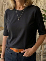 T-shirt comoda e minimalista a mezza manica, 100% cotone.