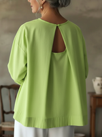Elegante top senza schienale in 100% cotone.