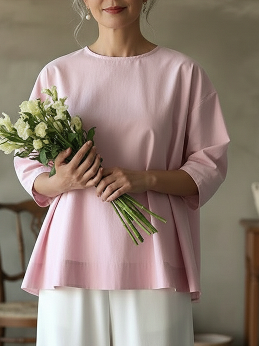 Elegante top senza schienale in 100% cotone.