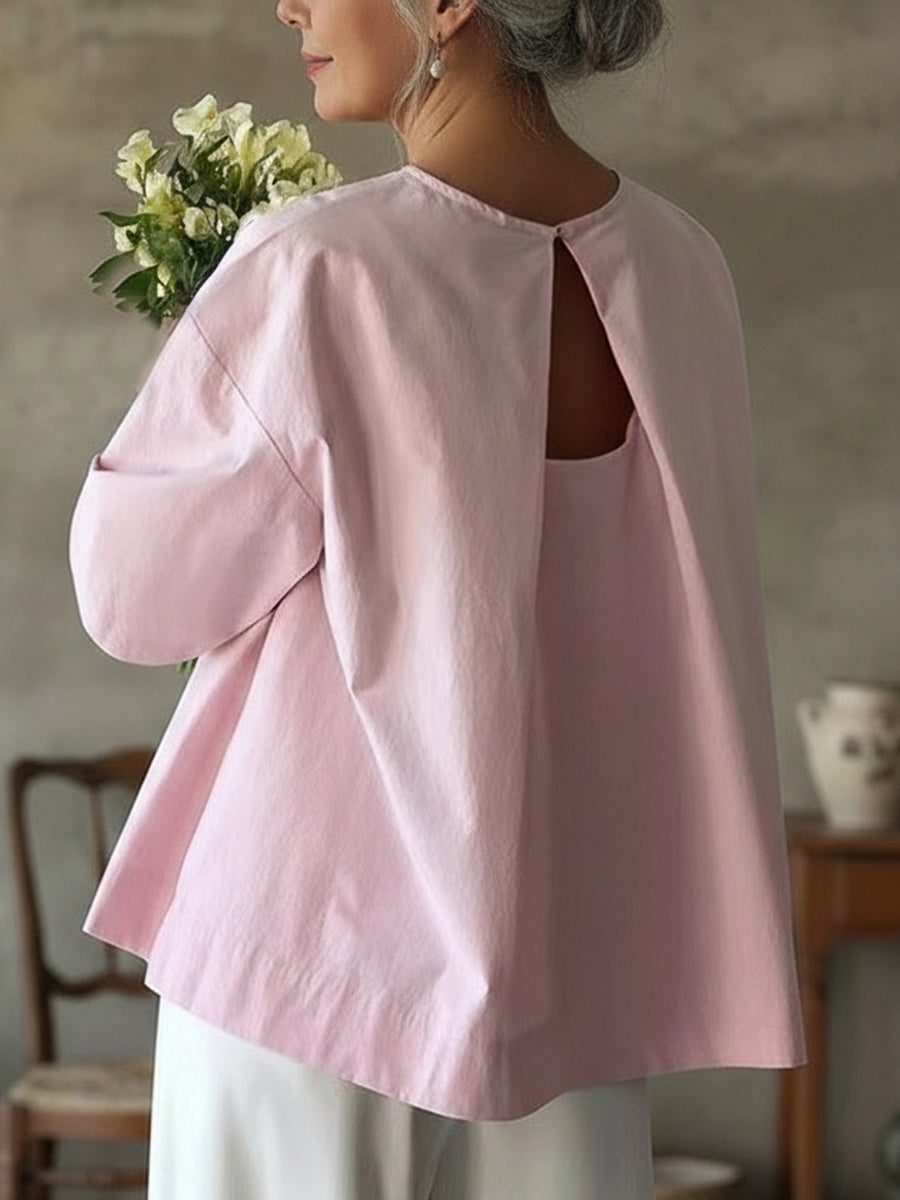 Elegante top senza schienale in 100% cotone.