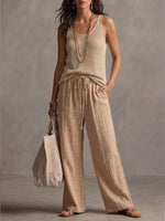 Three-piece Set Featuring A Casual Linen-cotton Blend Cardigan, Trousers, And A Knit Vest.