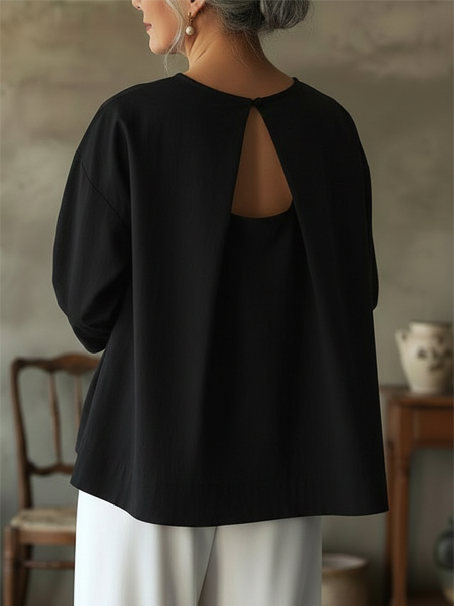 Elegante top senza schienale in 100% cotone.