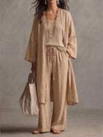Three-piece Set Featuring A Casual Linen-cotton Blend Cardigan, Trousers, And A Knit Vest.