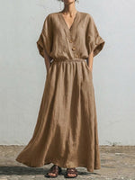 Wrap-style V-neck Cotton-linen Maxi Dress With Wooden Buttons, Batwing Short Sleeves, And A Fitted Waist.
