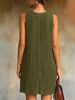 Stylish And Elegant Pleated Dress Featuring Bead-accented Paneling.